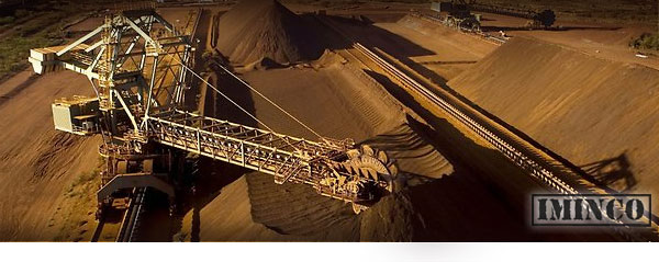 Iron ore mine site loader staacker stockpiling iron ore - iMINCO