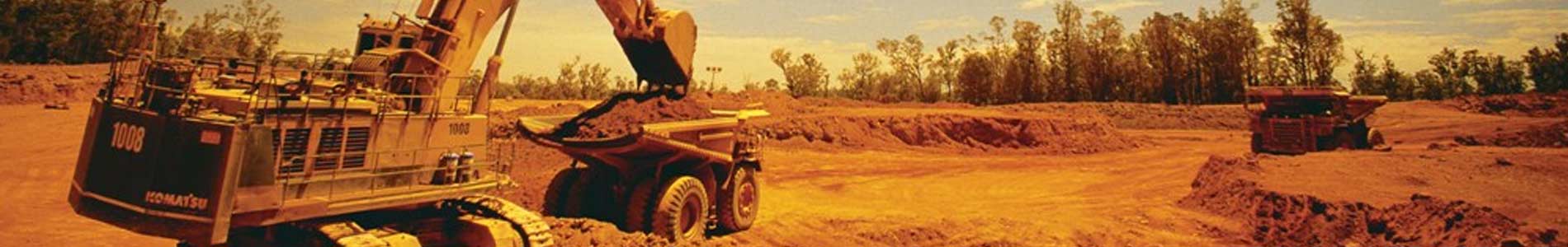 Mining iron ore dump truck and loader operations